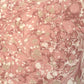 Printed marbled wrapping paper in dusty pink, taupe and white. 