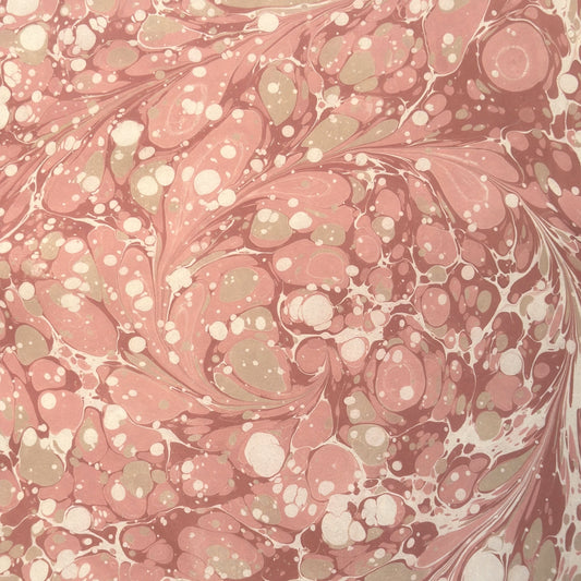 Printed marbled wrapping paper in dusty pink, taupe and white. 