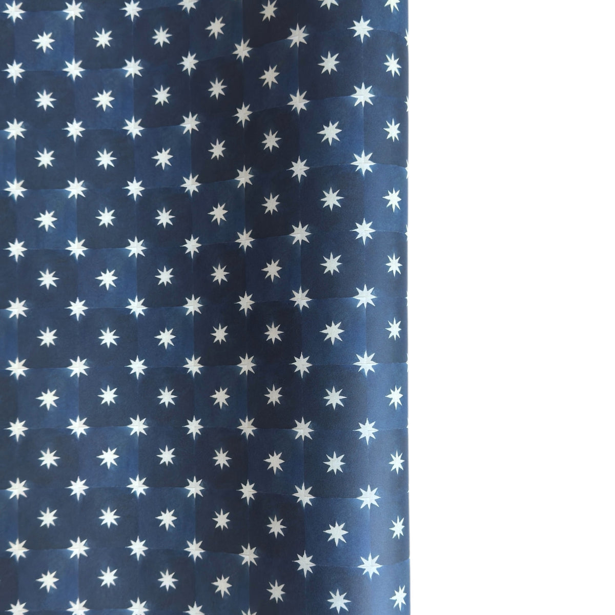 chequered navy blue with cream stars patterned wrapping paper 