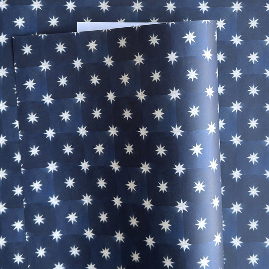 chequered navy blue with cream stars patterned wrapping paper 
