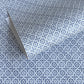 patterned paper / gift wrap with a blue and white tile design. By Wanderlust