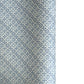 patterned paper / gift wrap with a blue and white tile design. By Wanderlust