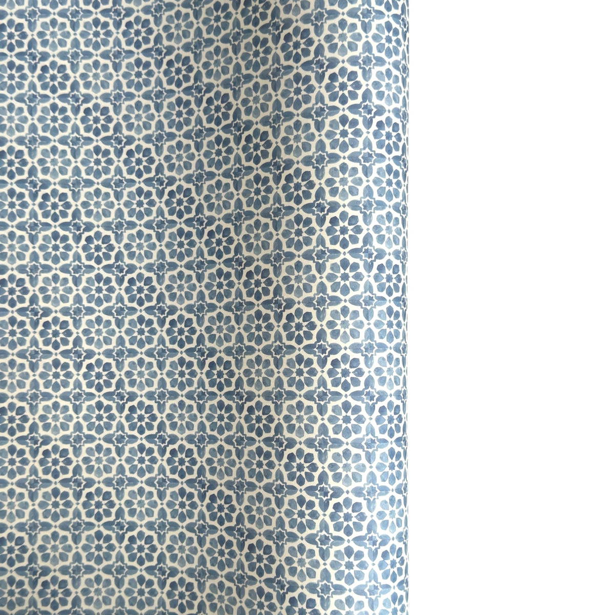 patterned paper / gift wrap with a blue and white tile design. By Wanderlust