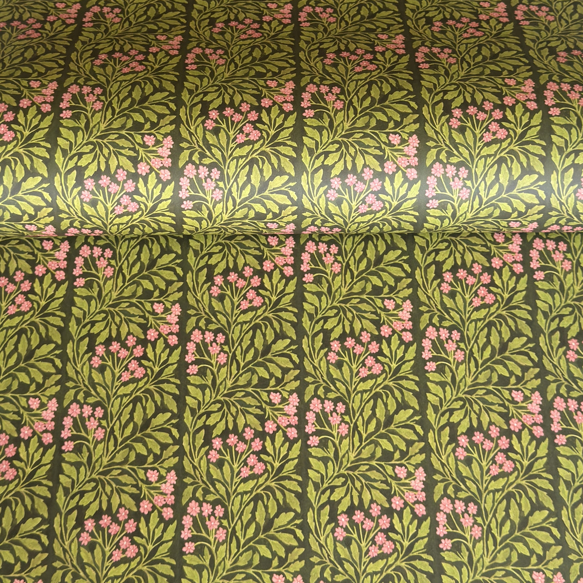floral patterned wrapping paper in green and pink