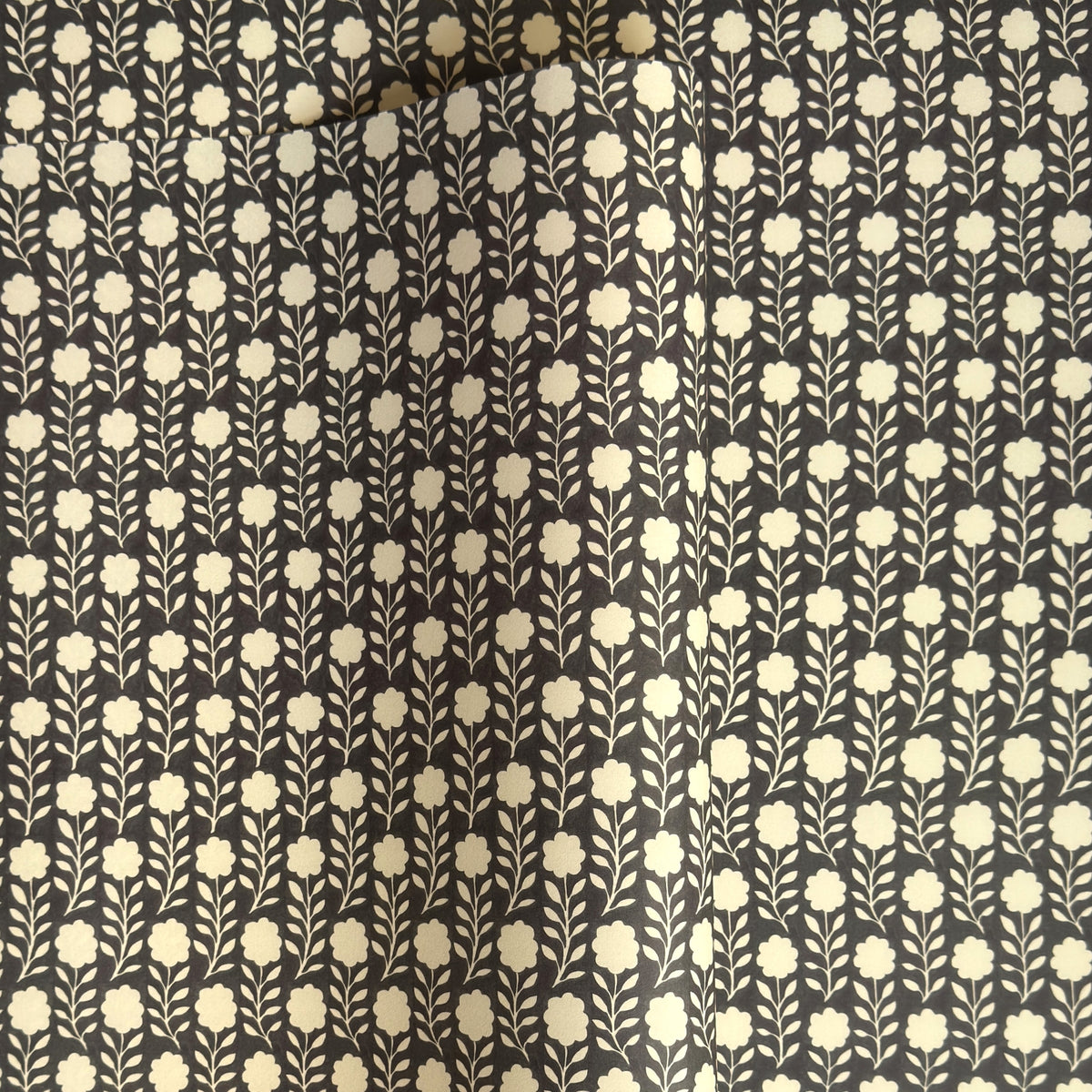 floral patterned wrapping paper in brown and cream