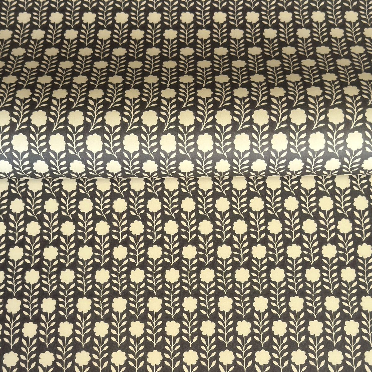 floral patterned wrapping paper in brown and cream