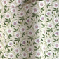 floral wrapping paper with pink passion flowers, green leaves on a cream background  