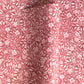 patterned paper / gift wrap with a delicate floral pattern in deep pink and white by Wanderlust