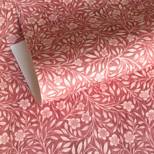patterned paper / gift wrap with a delicate floral pattern in deep pink and white by Wanderlust