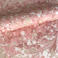 Printed marbled wrapping paper in dusty pink, taupe and white. 