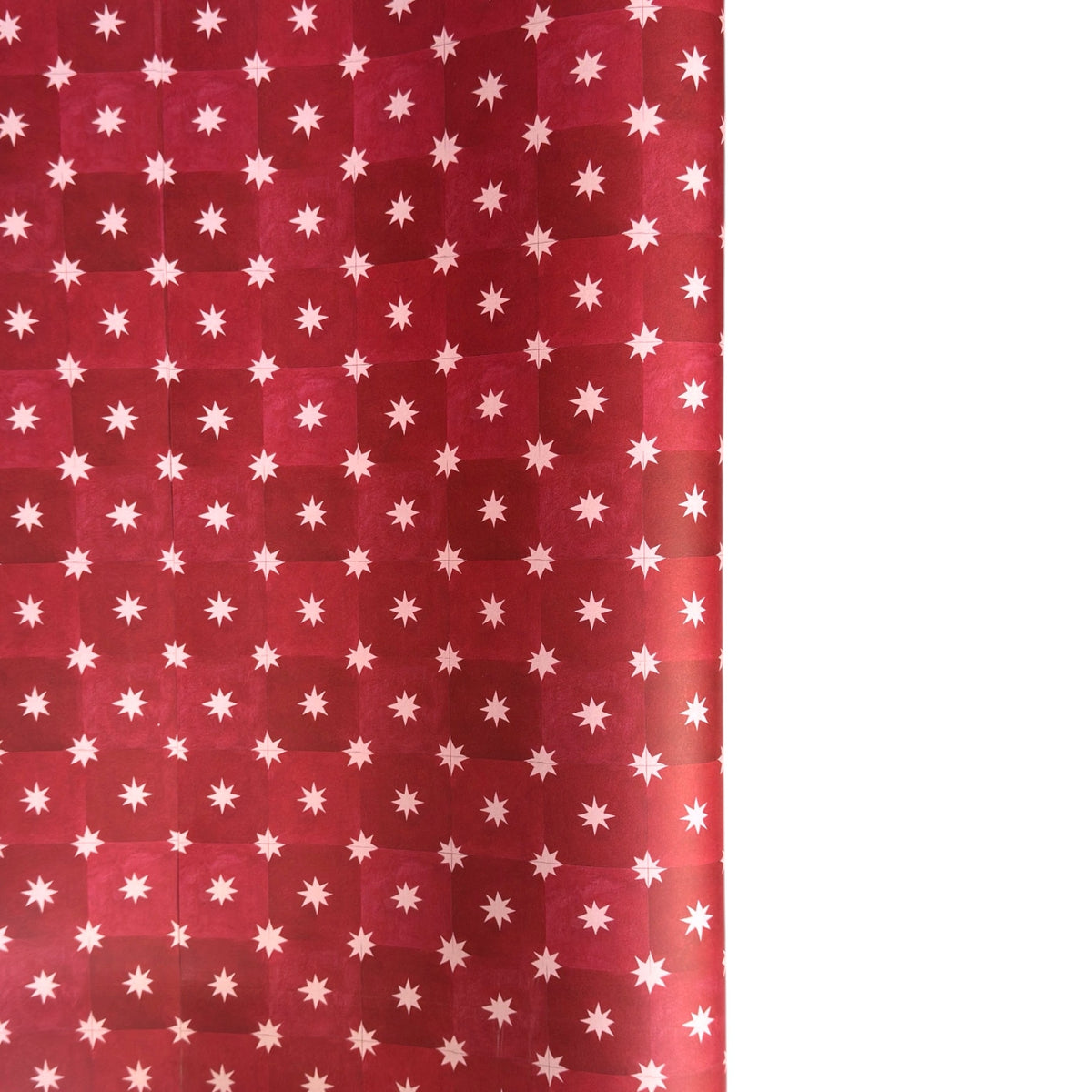Red two-tone checked wrapping paper by Wanderlust with a white star pattern 