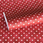 Red two-tone checked wrapping paper by Wanderlust with a white star pattern 