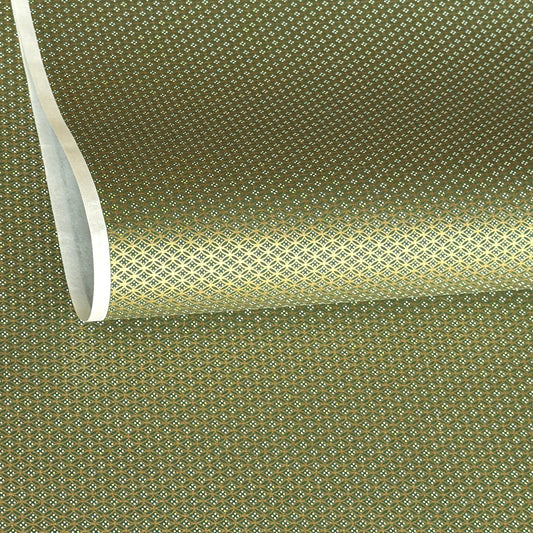 a sheet of Japanese silkscreen printed chiyogami paper with a mini geometric design in gold on green backdrop 