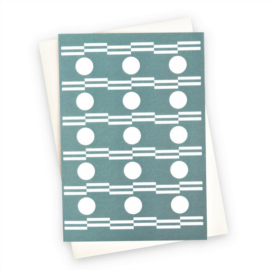 greetings card with abstract circle design in white and teal by Ola Studio