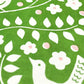 small greetings card with green bird and flowers design, close up of the card