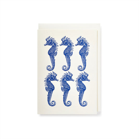small greetings card of six blue seahorses, by Archivist Gallery