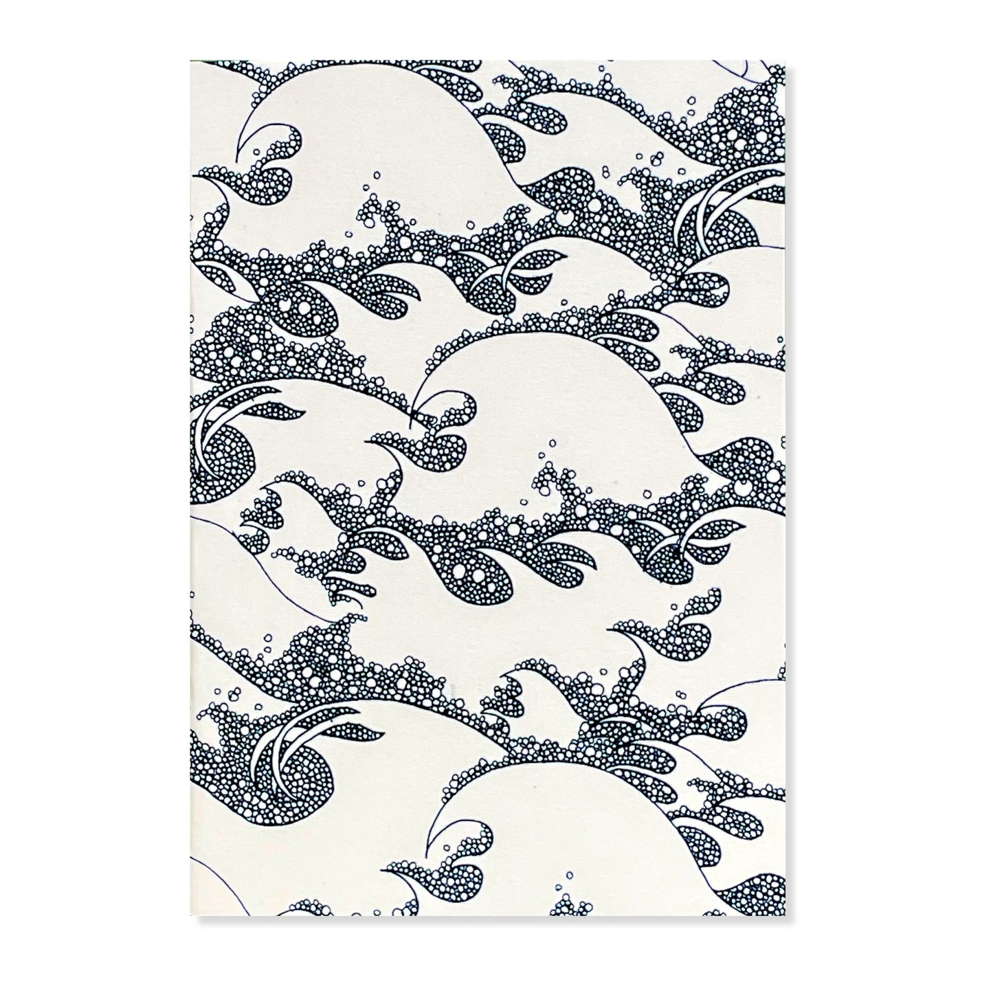 A5 slimline notebook with a delicate illustration of waves in dark blue on a ivory backdrop by Parisian brand Atelier Mouti