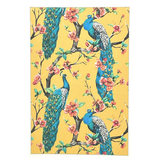 greetings card of four peacocks in a tree in blossom with yellow backdrop by Com Bossa Studio