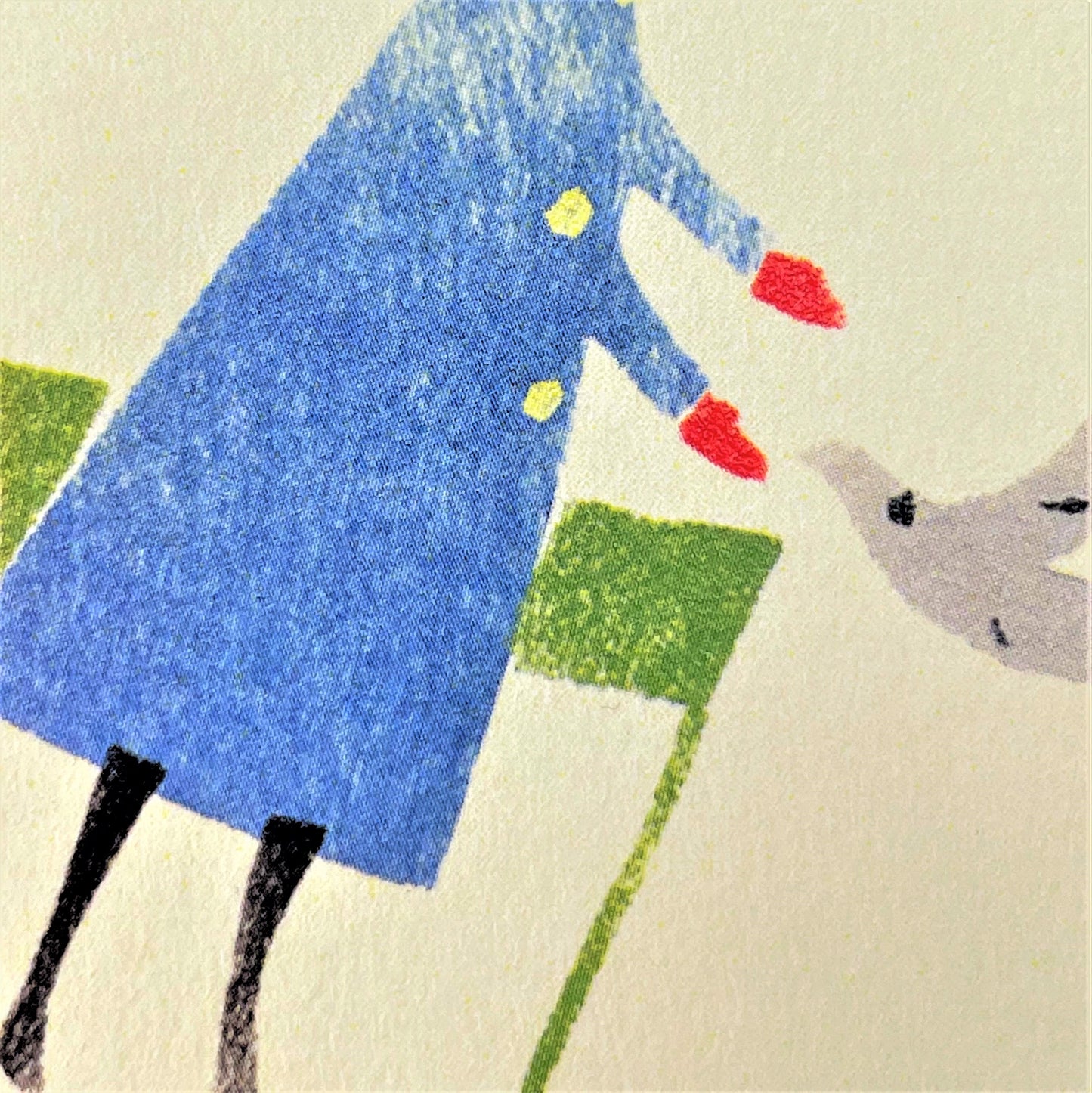 greetings card with drawing of mother and two children feeding the birds in a park, close up of the card