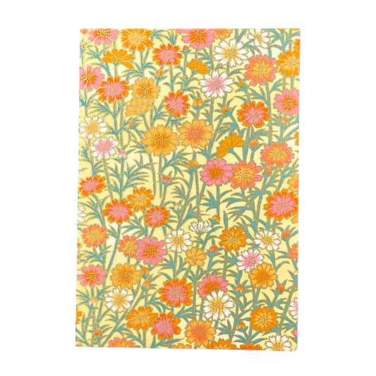 japanese silk-screen printed greetings card with repeat daisy pattern in yellow, pink and orange by Esmie