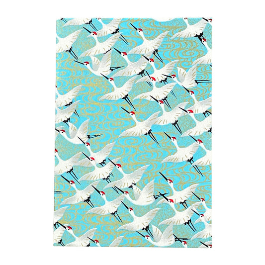 japanese silk-screen printed greetings card with a repeat diagonal pattern of white cranes on an aqua backdrop by Esmie