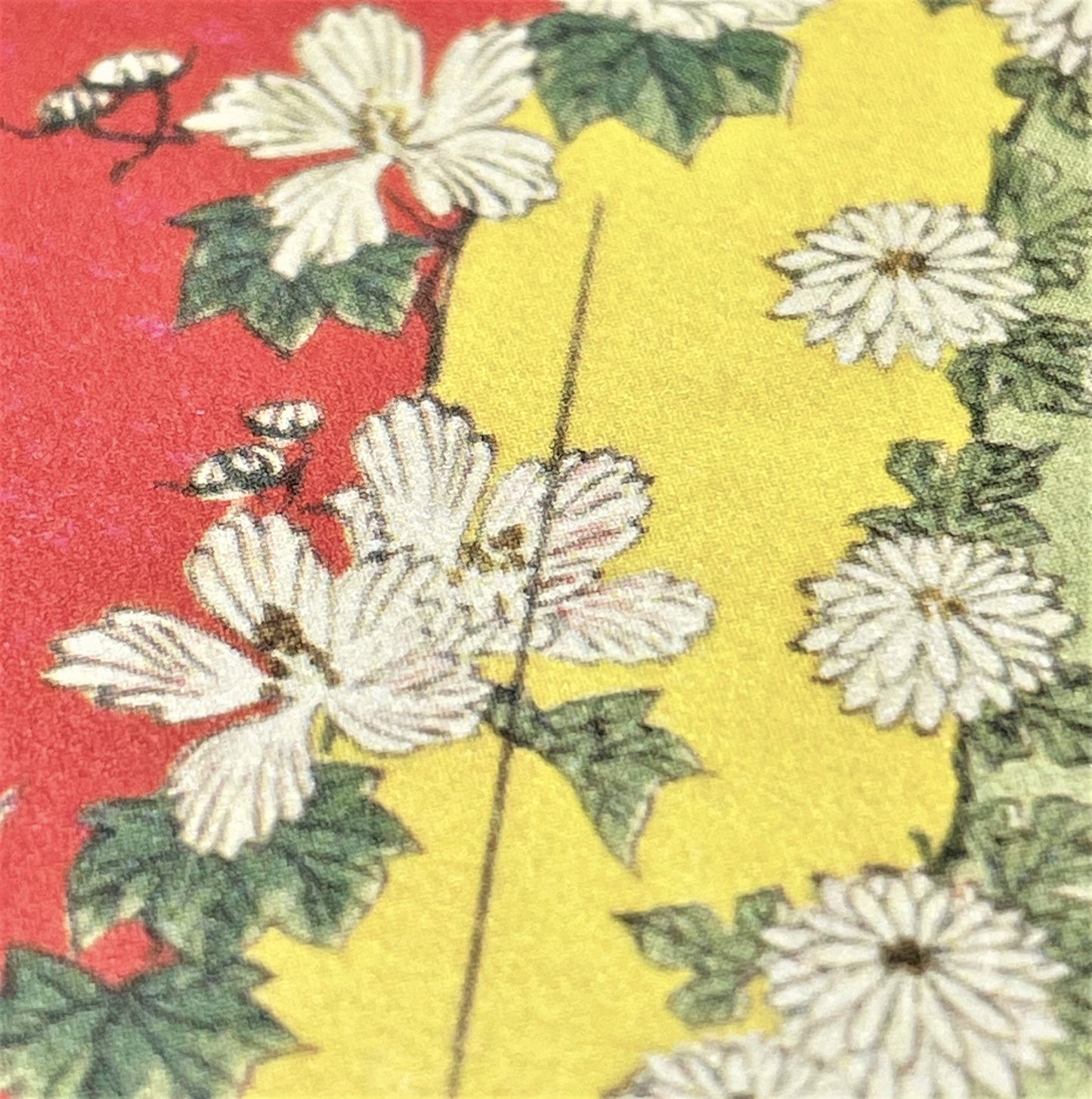 greetings card of a drawing of a bright floral kimono in red, yellow. green and lilac, close up of the pattern
