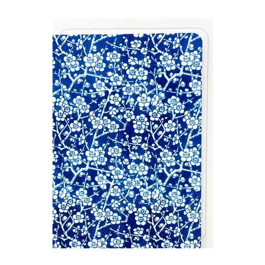 greetings card showing a small scale blue and white cherry blossom repeat pattern by Ezen design