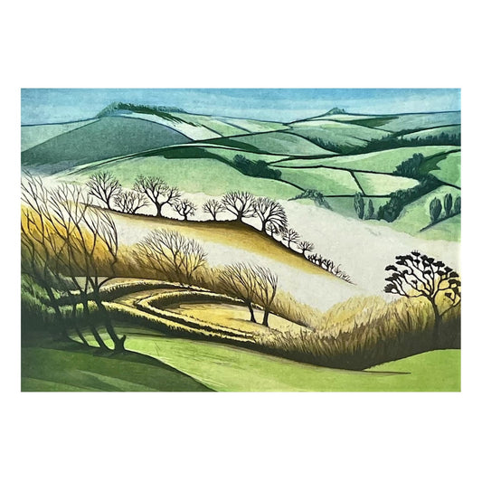 greetings card showing a green valley with trees in the mist by John Austin Publishing