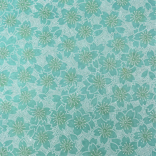 japanese silk-screen paper, chiyogami, with a cherry blossom flower repeat pattern in turquoise and white