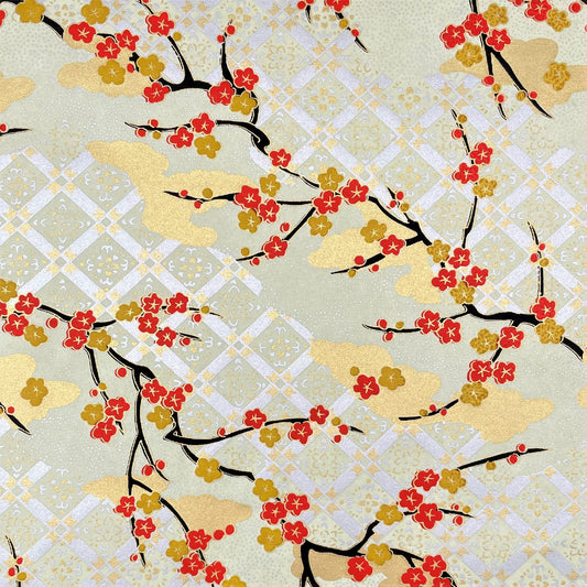 japanese silk-screen handmade paper, chiyogami, showing branches of red cherry blossom and gold clouds on a backdrop of silver, cream and gold