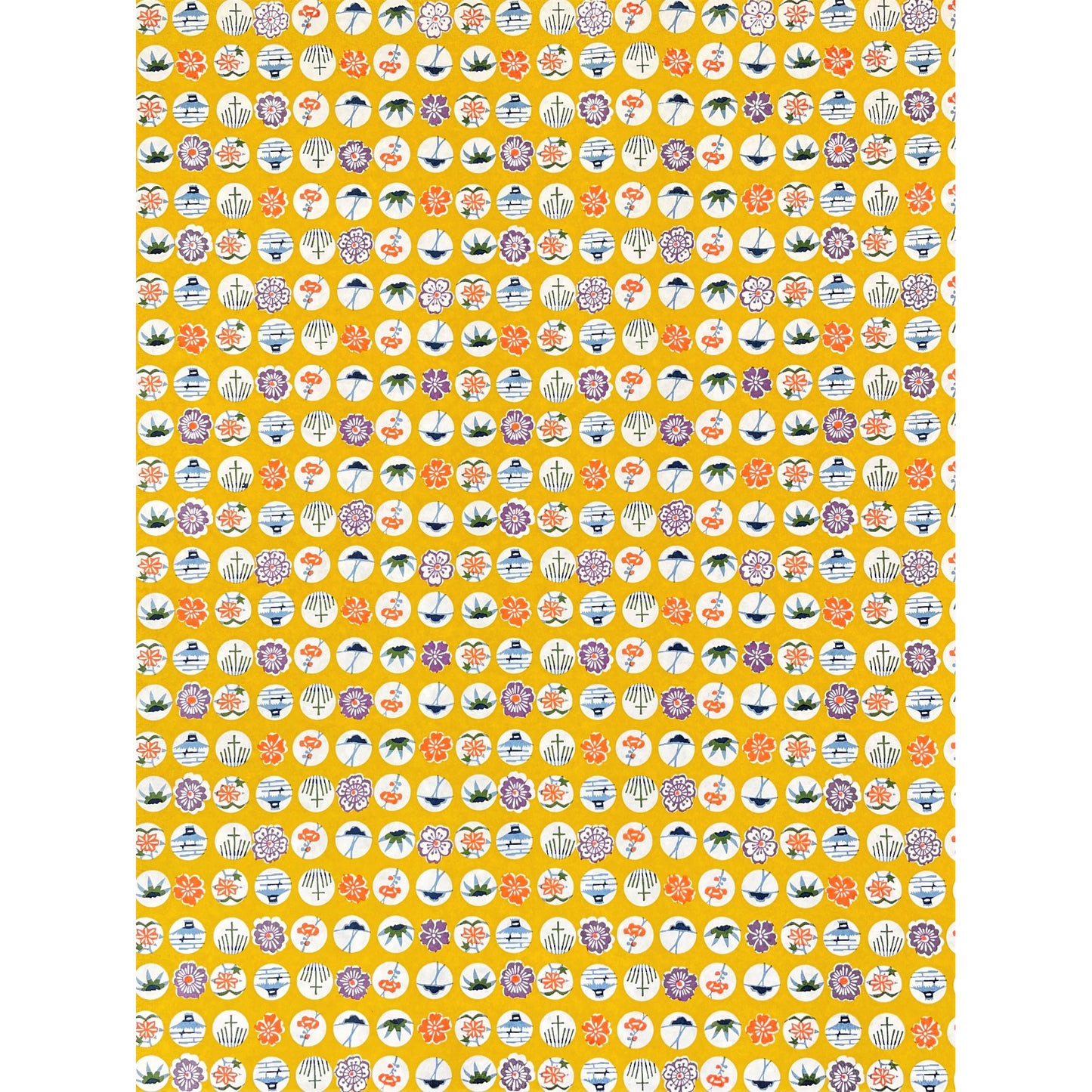 japanese silk-screen handmade paper showing circles of traditional motifs on yellow backdrop, full sheet view