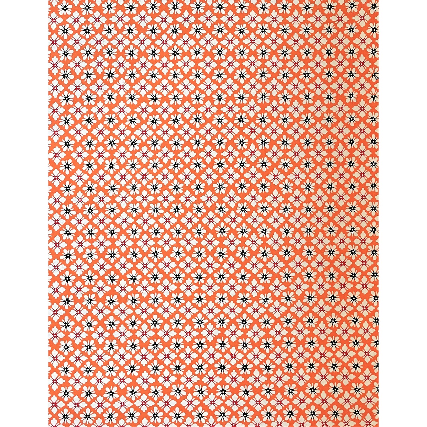 japanese stencil-dyed handmade paper with small scale floral repeat in orange and cream, full sheet view
