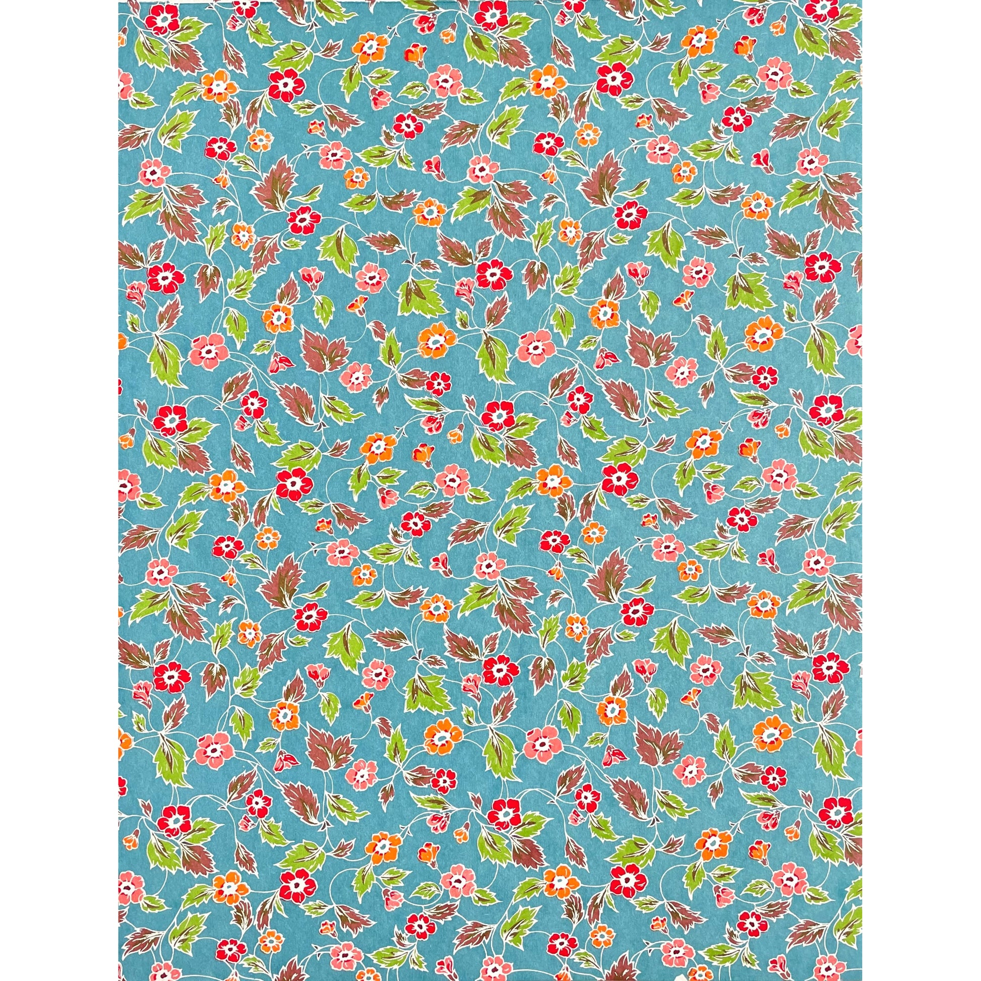 japanese stencil-dyed handmade paper with delicate repeat multi colour floral pattern on blue backdrop, full sheet view