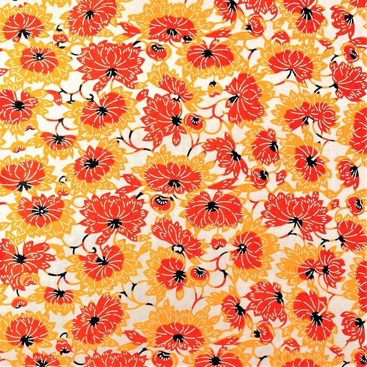 japanese stencil-dyed handmade paper with yellow and orange chrysanthemum repeat pattern