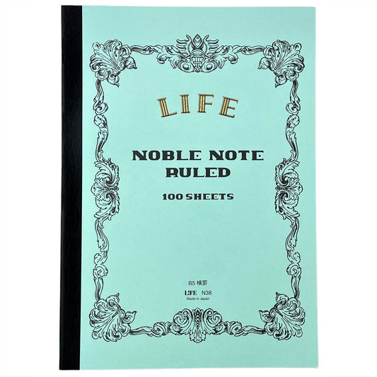 Softcover notebook with lined pages.  The cover is plain aqua with a decorative black border and branding, Life Noble Ruled by Japanese brand Life