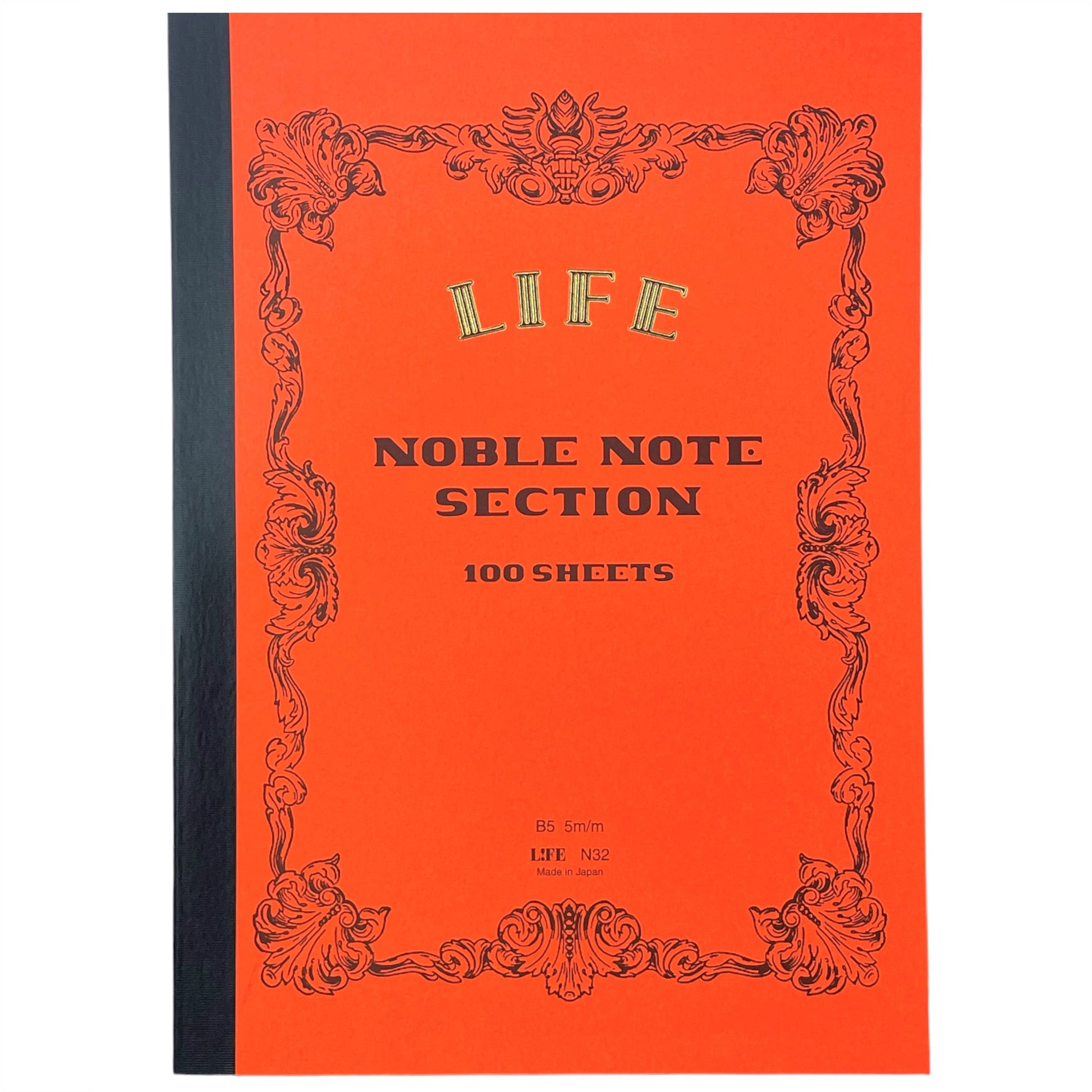 Softcover notebook with grid pages. The cover is plain red with a decorative black border and branding.  Life Noble range by Japanese brand Life