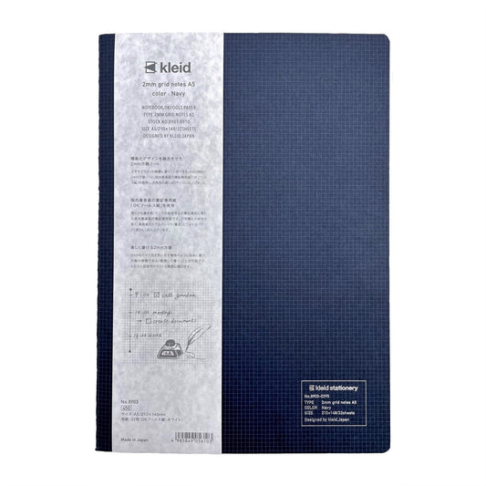 A5 soft cover notebook, cover is navy with a small white grid pattern by Japanese brand Kleid