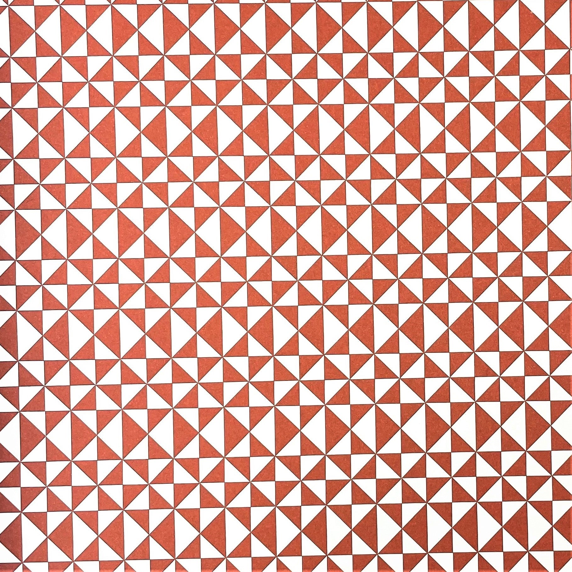 wrapping paper with an abstract triangle pattern in brick red and white by Ola Studio