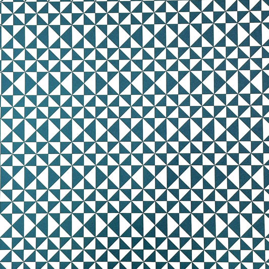 wrapping paper with an abstract triangle pattern in deep teal and white by Ola Studio