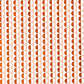 wrapping paper with an abstract circle pattern in orange and pale pink by Ola Studio