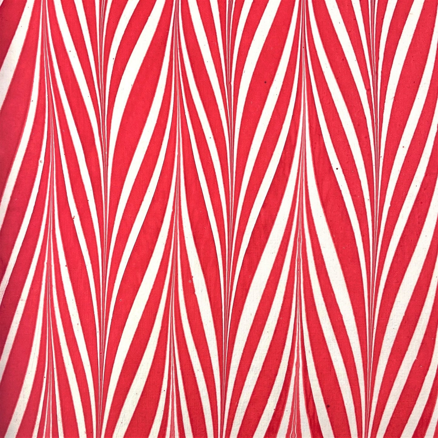 wrapping paper with marbled chevron pattern in red and white by Paper Mirchi