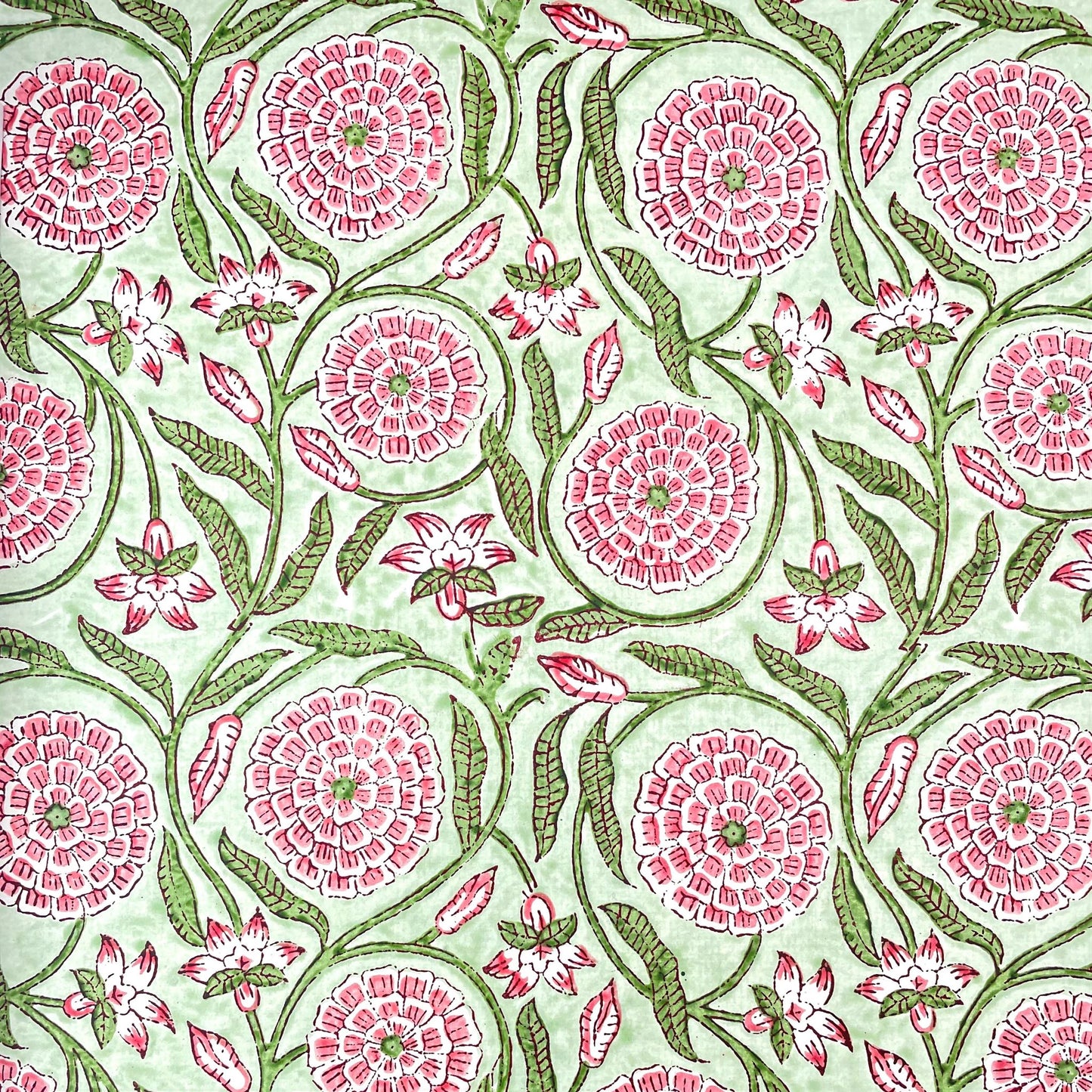 wrapping paper with repeat botanical pattern in pistachio green and pink by Paper Mirchi