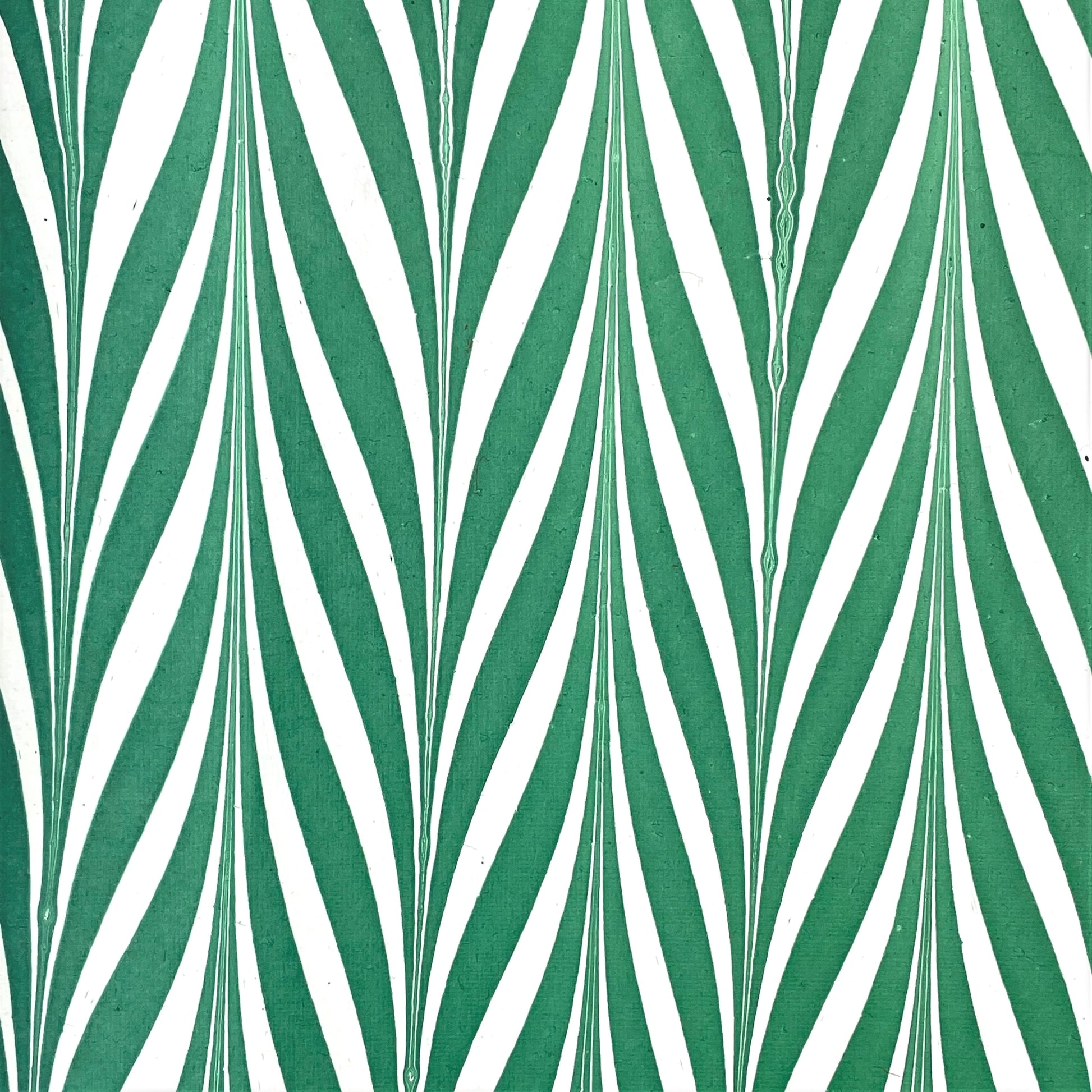 wrapping paper with marbled chevron pattern in green and white by Paper Mirchi