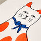 hand-painted greetings card of a orange and blue cat, close-up