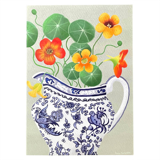 greeting card of a painting of yellow and orange nasturtiums in a blue and white jug with a bird design by Susie Hamilton